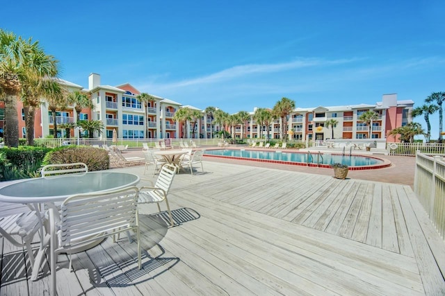 6170 A1A S Unit 101, Saint Augustine, FL 32080 - deck with a community pool and outdoor dining space
