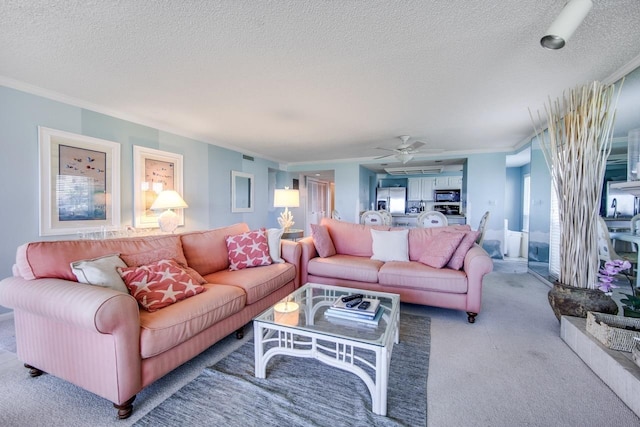 6170 A1A S Unit 101, Saint Augustine, FL 32080 - living area featuring crown molding, light carpet, a textured ceiling, and a ceiling fan