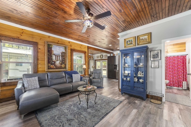 10635 Beckenger Ave, Hastings, FL 32145 - living area featuring ornamental molding, wood finished floors, a ceiling fan, and wooden ceiling