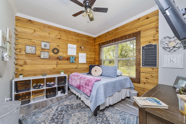 10635 Beckenger Ave, Hastings, FL 32145 - bedroom with a textured ceiling, ornamental molding, and wood finished floors