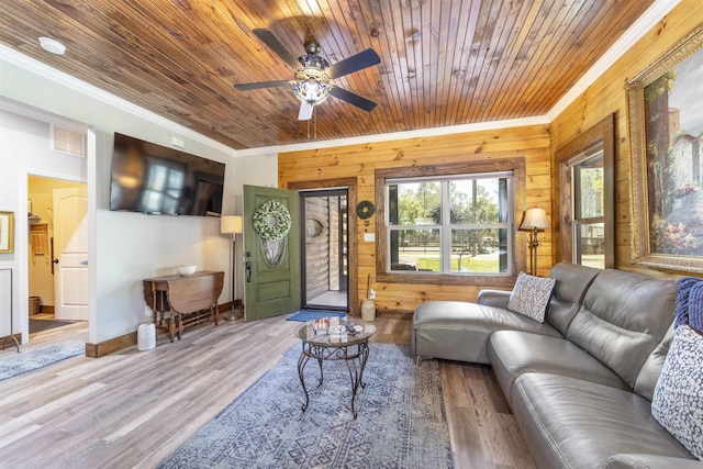 10635 Beckenger Ave, Hastings, FL 32145 - living area with visible vents, crown molding, and wood finished floors