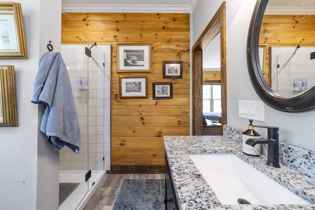10635 Beckenger Ave, Hastings, FL 32145 - full bath featuring wood finished floors, crown molding, wood walls, and a shower stall