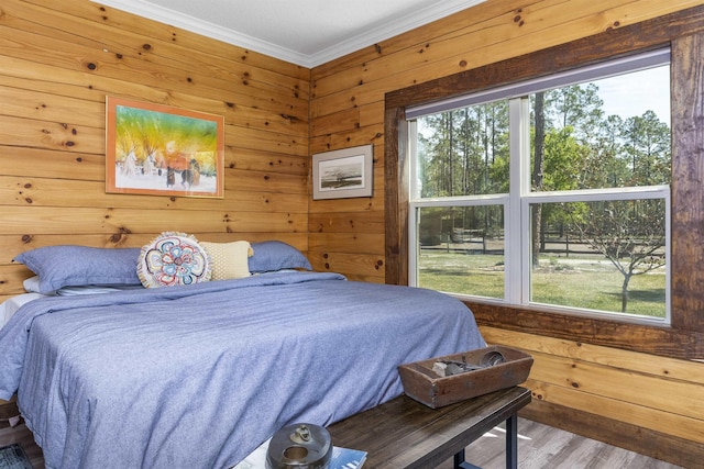 10635 Beckenger Ave, Hastings, FL 32145 - bedroom featuring crown molding, wood walls, and wood finished floors