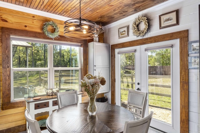 10635 Beckenger Ave, Hastings, FL 32145 - sunroom featuring french doors and an inviting chandelier
