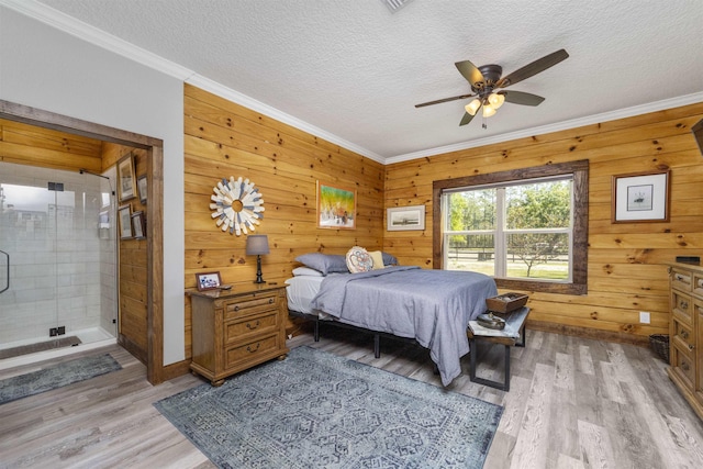 10635 Beckenger Ave, Hastings, FL 32145 - bedroom with crown molding, light wood finished floors, and a textured ceiling