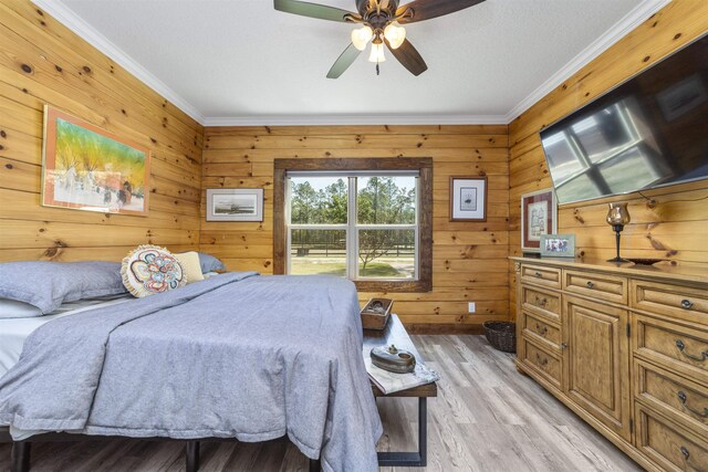 10635 Beckenger Ave, Hastings, FL 32145 - bedroom with a ceiling fan, light wood-style floors, and crown molding