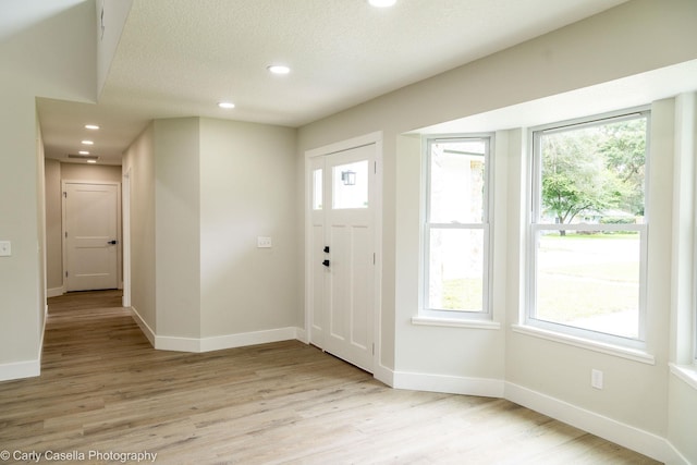 552 Fox Hollow Ln, Saint Augustine, FL 32086 - foyer entrance featuring light wood-style flooring and recessed lighting