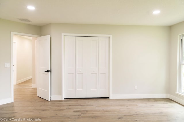 552 Fox Hollow Ln, Saint Augustine, FL 32086 - unfurnished bedroom featuring recessed lighting, light wood-type flooring, and a closet