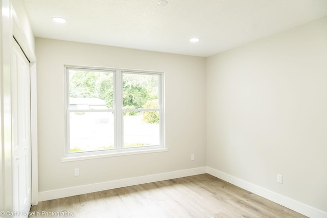 552 Fox Hollow Ln, Saint Augustine, FL 32086 - unfurnished bedroom with light wood-style floors, a closet, and recessed lighting