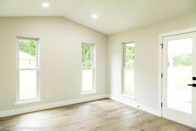552 Fox Hollow Ln, Saint Augustine, FL 32086 - spare room featuring vaulted ceiling, light wood finished floors, plenty of natural light, and recessed lighting
