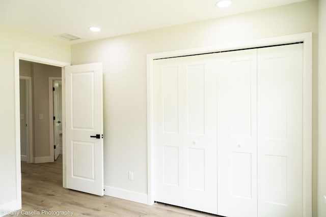 552 Fox Hollow Ln, Saint Augustine, FL 32086 - unfurnished bedroom with light wood-style flooring, a closet, and recessed lighting