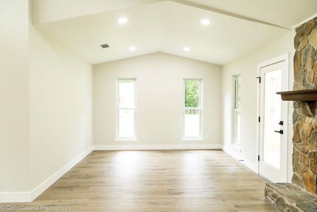 552 Fox Hollow Ln, Saint Augustine, FL 32086 - spare room with light wood-type flooring and lofted ceiling