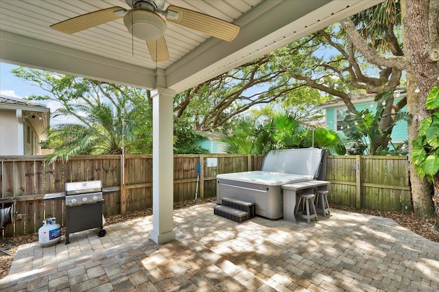 403 Second St, Saint Augustine, FL 32084 - view of patio featuring ceiling fan, a fenced backyard, grilling area, and a hot tub