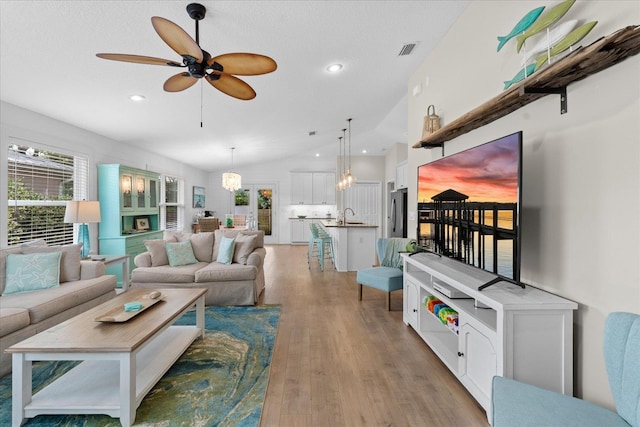 403 Second St, Saint Augustine, FL 32084 - living area with recessed lighting, light wood-style floors, visible vents, a ceiling fan, and lofted ceiling