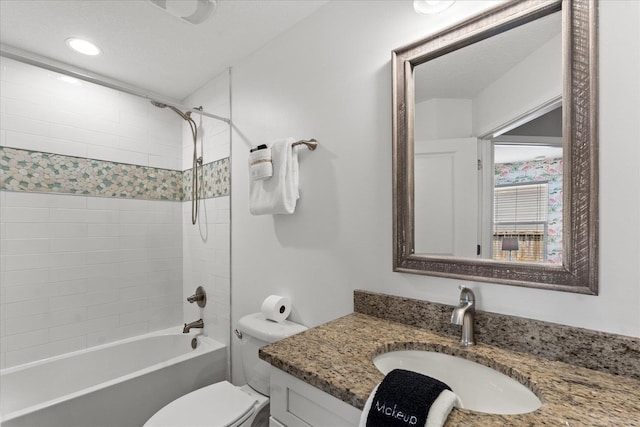 403 Second St, Saint Augustine, FL 32084 - bathroom featuring toilet, recessed lighting, vanity, and shower / bathing tub combination