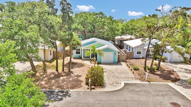 403 Second St, Saint Augustine, FL 32084 - view of front of property featuring driveway, an attached garage, and fence