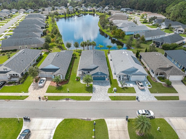 drone / aerial view featuring a water view