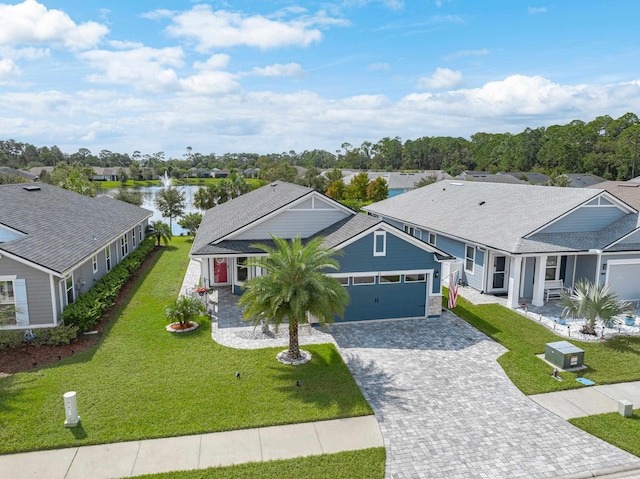 single story home with a garage and a front yard