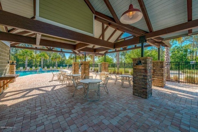 view of patio / terrace featuring a community pool