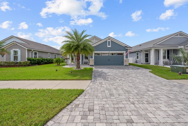 single story home with a garage and a front lawn