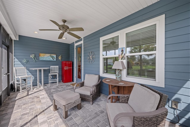 view of patio featuring ceiling fan