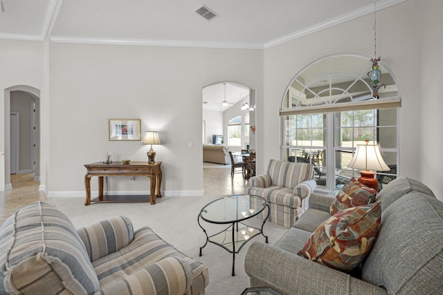 carpeted living room featuring crown molding