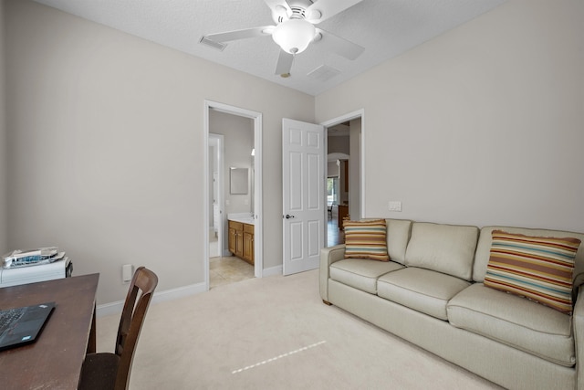 carpeted living room featuring ceiling fan