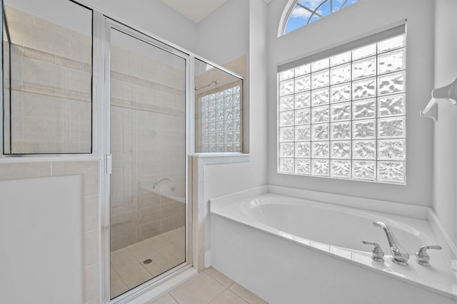 bathroom with plus walk in shower and tile patterned floors