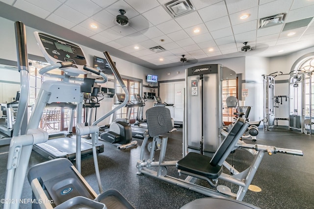 exercise room with a drop ceiling