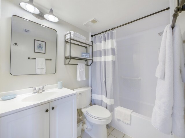 full bath with vanity, tile patterned floors, toilet, and visible vents