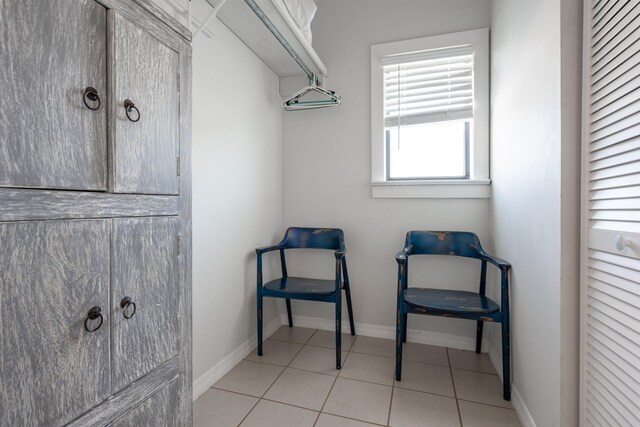 spacious closet featuring light tile patterned floors