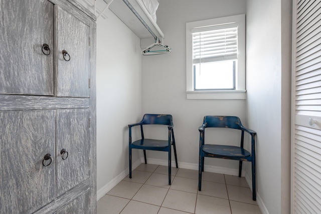 spacious closet featuring tile patterned flooring