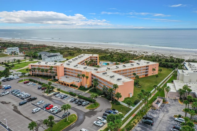 bird's eye view with a view of the beach and a water view