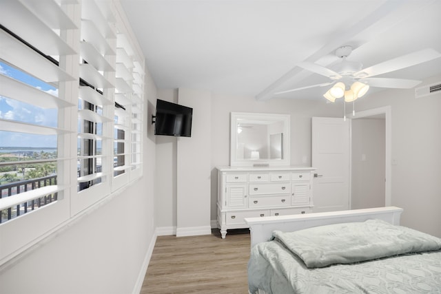 7990 A1A S, Saint Augustine, FL 32080 - bedroom with baseboards, light wood-type flooring, and a ceiling fan