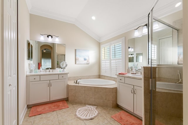 bathroom featuring tile patterned flooring, separate shower and tub, ornamental molding, and vaulted ceiling