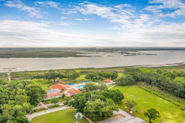 aerial view with a rural view and a water view