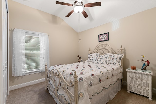 bedroom with carpet, ceiling fan, and vaulted ceiling