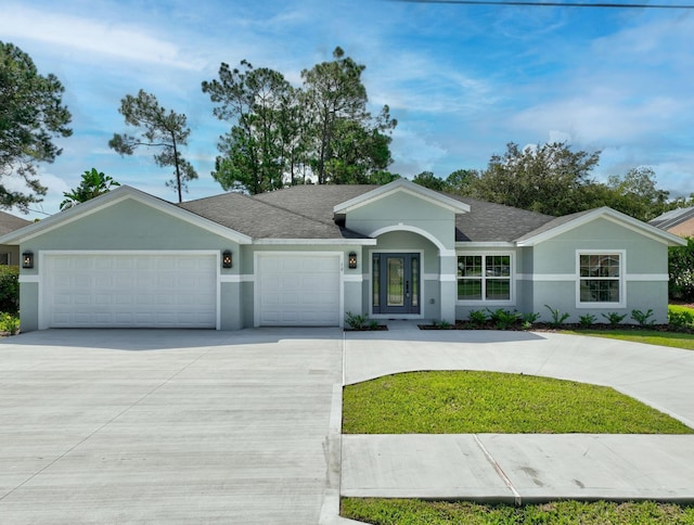 ranch-style house featuring a garage