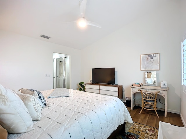 bedroom with hardwood / wood-style floors and ceiling fan