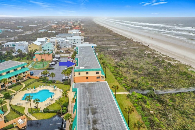 aerial view with a view of the beach and a water view