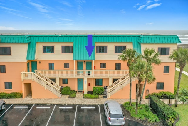 view of building exterior featuring a water view