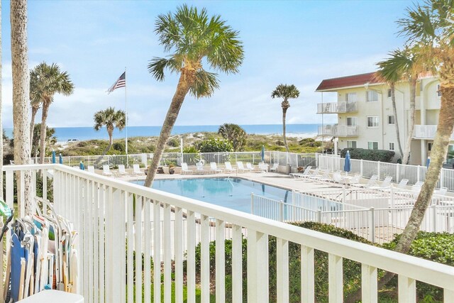 view of pool with a water view