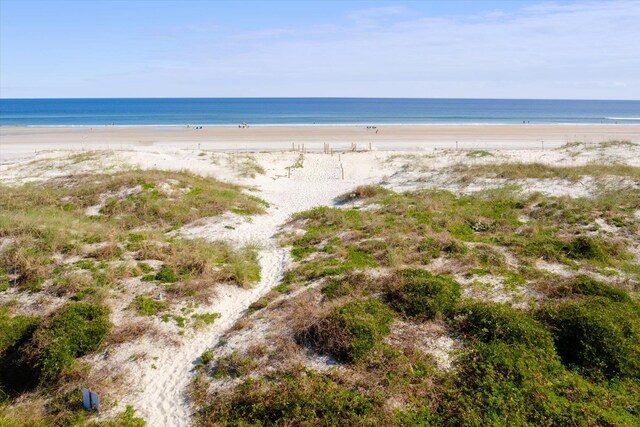 property view of water featuring a beach view