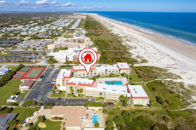 bird's eye view with a view of the beach and a water view