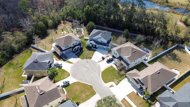 aerial view with a water view and a residential view