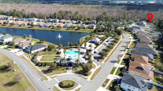 aerial view with a water view and a residential view