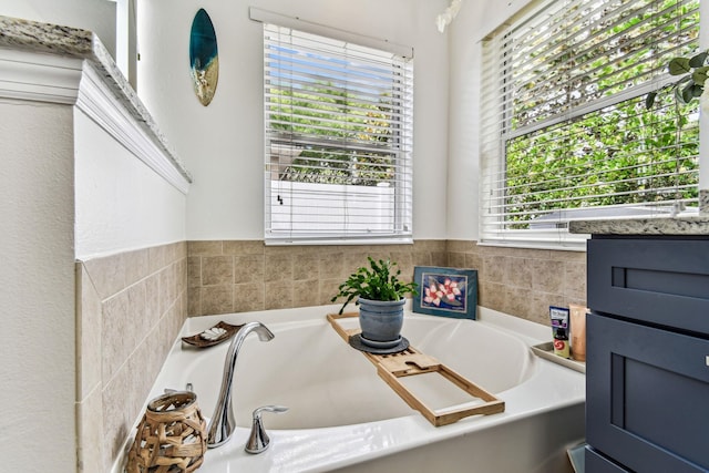 bathroom featuring a bath