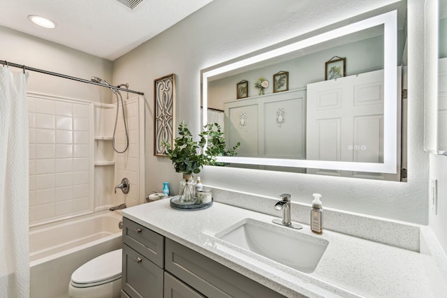 full bath with vanity, toilet, and shower / tub combo with curtain