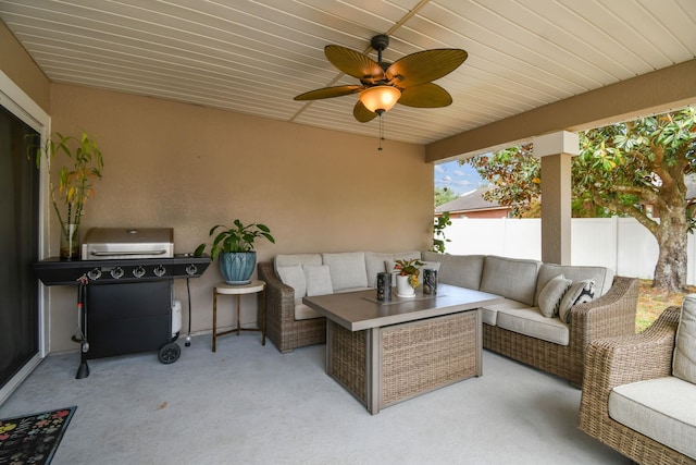 view of patio / terrace with an outdoor hangout area, a ceiling fan, fence, and area for grilling