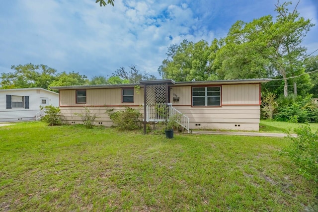 view of front of house with a front yard